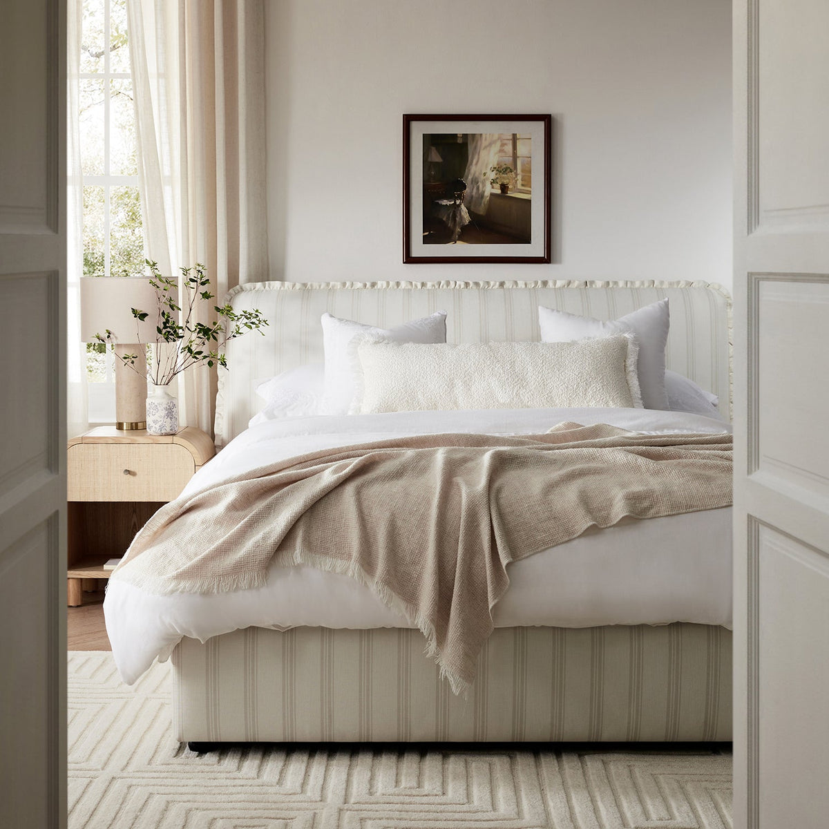 Celeste Upholstered Storage Bed with Ruffled Headboard in Seashell Stripe