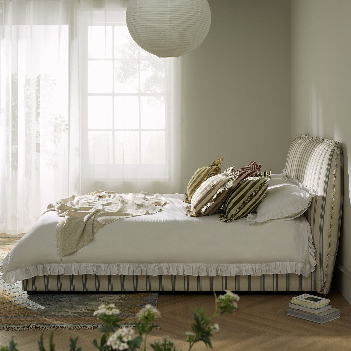 Celeste Upholstered Storage Bed with Ruffled Headboard in Laurel Green Stripe