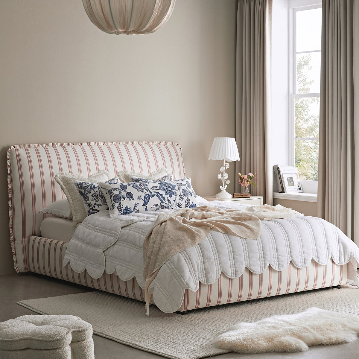 Celeste Upholstered Storage Bed with Ruffled Headboard in Peony Red Stripe