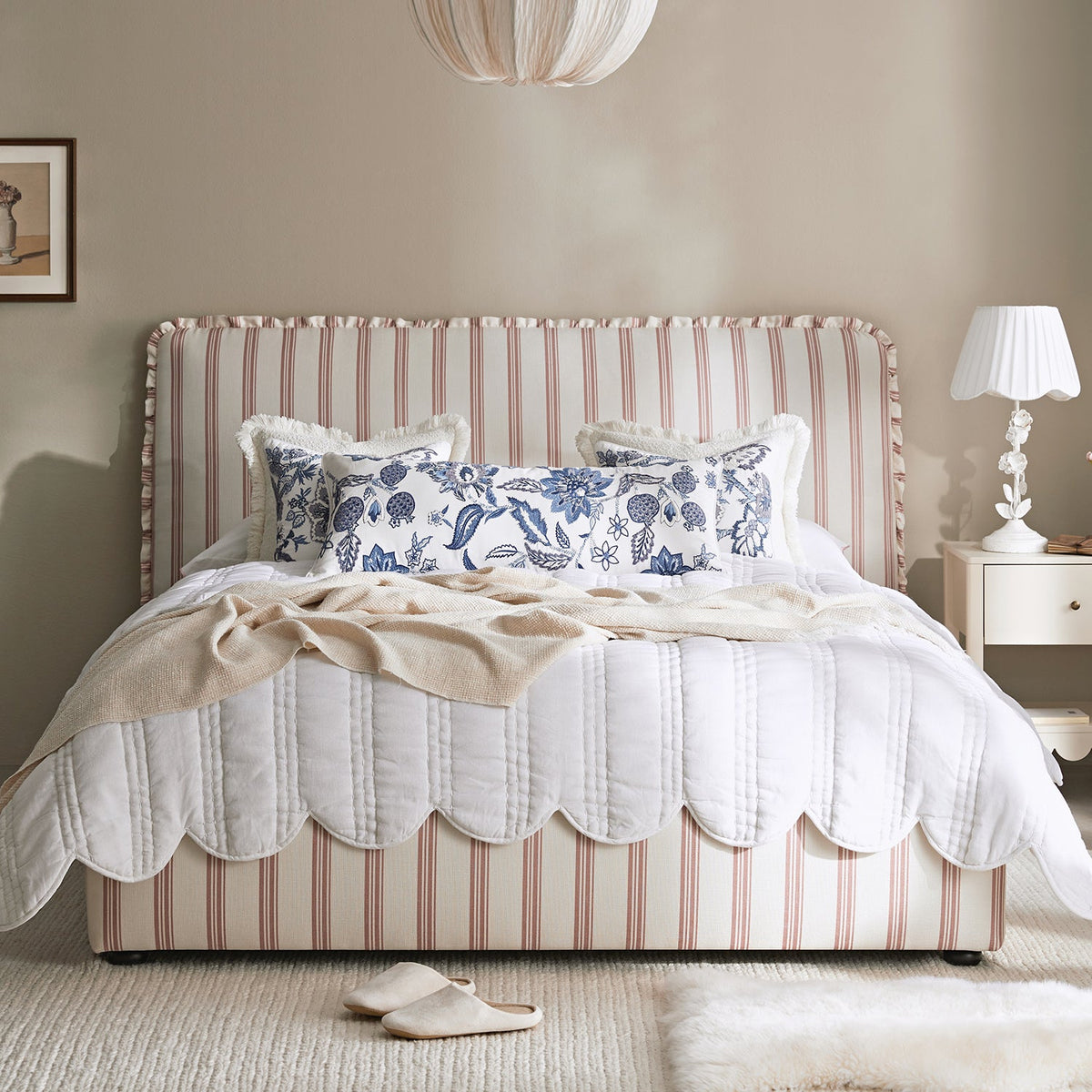 Celeste Upholstered Storage Bed with Ruffled Headboard in Peony Red Stripe