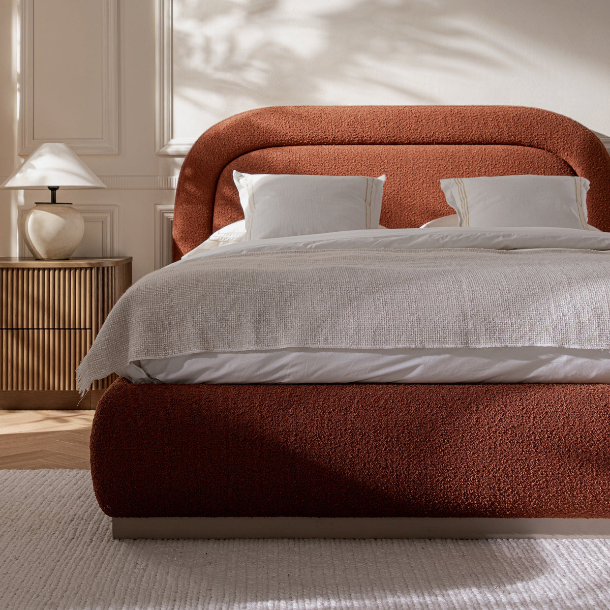 Luella Upholstered Wooden Plinth Base Storage Bed in Rust Boucle