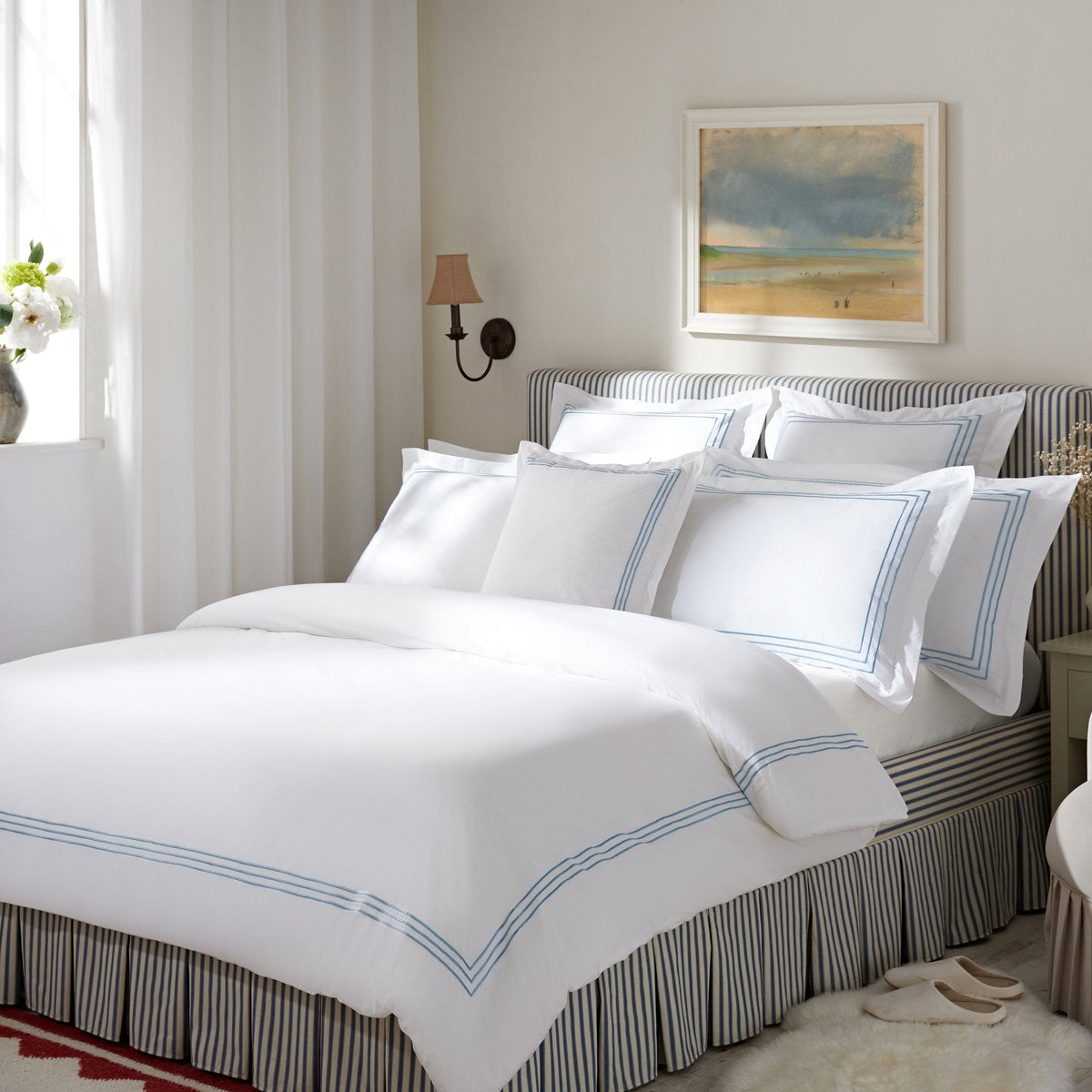 Egerton Box-Pleat Ottoman Storage Bed in Blue Striped Linen
