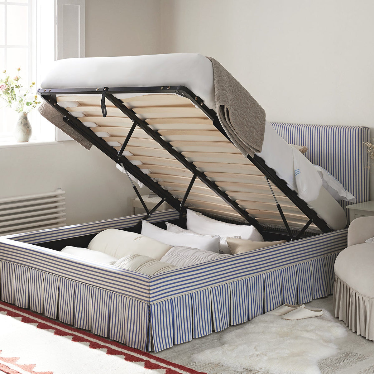 Egerton Box-Pleat Ottoman Storage Bed in Blue Striped Linen