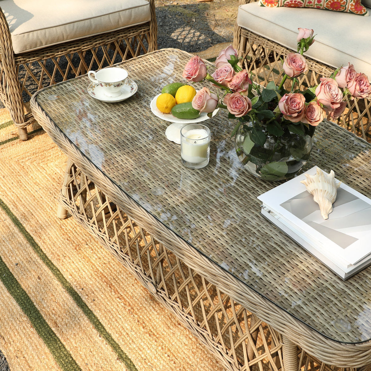 Willowbrook rising table at coffee height with a glass top