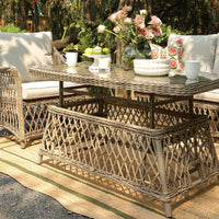 Willowbrook rising table raised to dining height with table setting – image 11 of 15